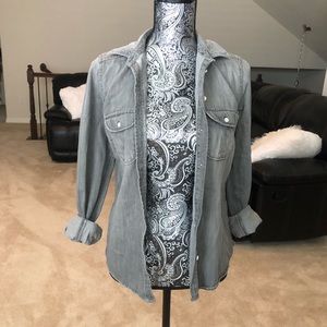 A green-clay color jacket.